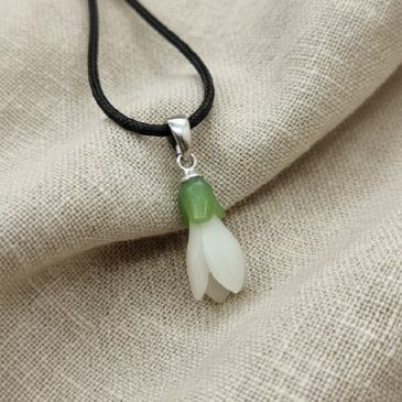 This Snowdrop Pendant captures the elegance of early spring. Handcrafted from white and green nephrite jade, the delicate floral…