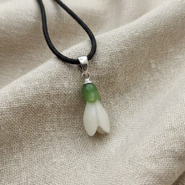 Snowdrop pendant, carved from natural white and green nephrite jade. Elegantly suspended on a gold chain. Unique, handcrafted, e…