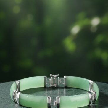 Elevate your style with this exquisite handcrafted bracelet, featuring genuine jade beads paired with sterling silver accents. A…