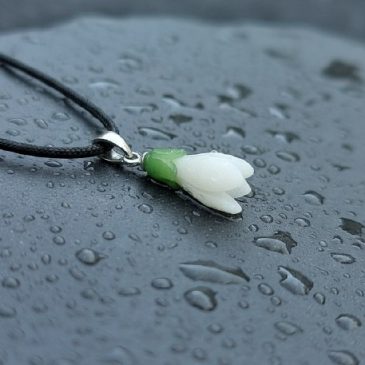Exquisite Snowdrop Pendant crafted from fine white and green nephrite. This elegant piece captures nature’s first bloom in polis…