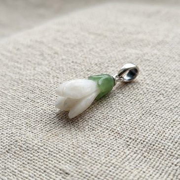 Handcrafted white and green jade snowdrop pendant. A delicate symbol of spring and new beginnings.