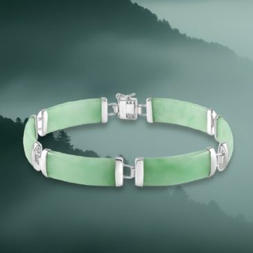 This elegant bracelet features a stunning harmony of natural green jade beads and polished sterling silver accents. A timeless a…