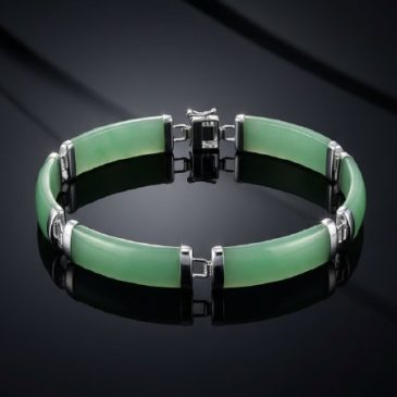 This elegant jade and silver bracelet (21).jpeg blends timeless tradition with modern luxury. Hand-carved natural jadeite meets …