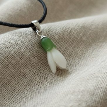 This Snowdrop Pendant captures the elegance of early spring. Handcrafted from premium white and green nephrite jade, the delicat…