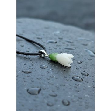 Embodying the first breath of spring, this Snowdrop Pendant features hand-carved white and green nephrite. A timeless piece of e…