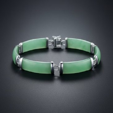 This elegant bracelet features a stunning harmony of natural green jade and polished sterling silver. A timeless accessory that …